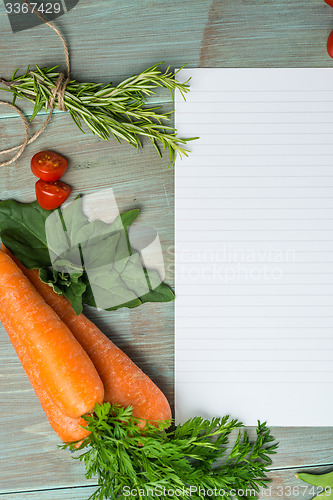Image of White paper and vegetables