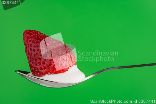 Image of Strawberry and chocolate on a fork
