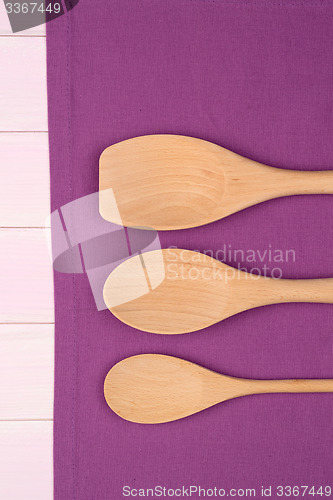 Image of Kitchenware on purple towel