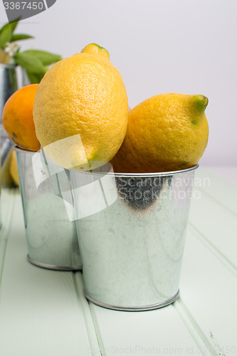 Image of Limes on wooden table