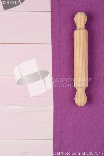 Image of Kitchenware on purple towel