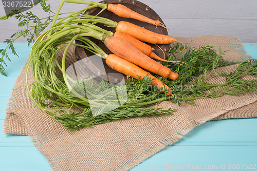 Image of Carrots on a wooden table