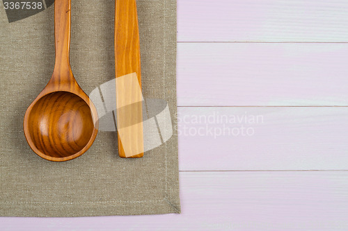 Image of Kitchenware on beige towel