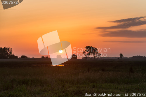 Image of Sunset over the meadow