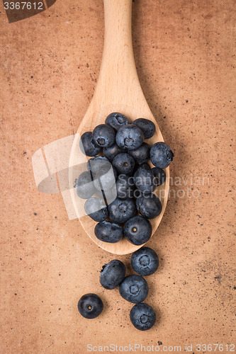 Image of Blueberries on a wooden spoon