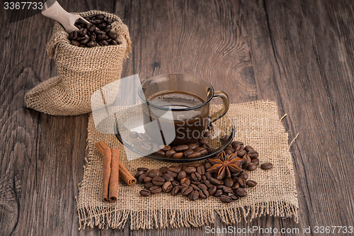 Image of Coffee cup with burlap sack