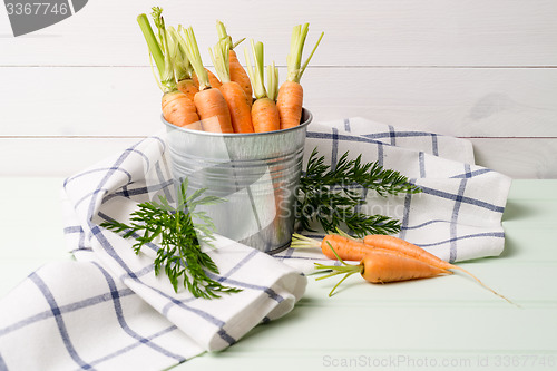 Image of Carrots on wooden table