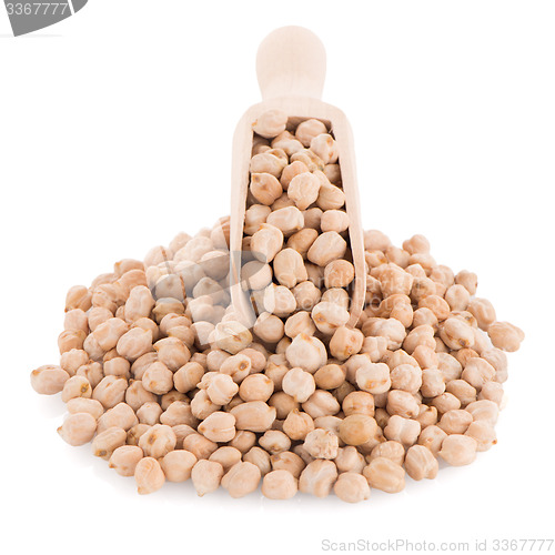 Image of Uncooked chickpeas and wooden scoop