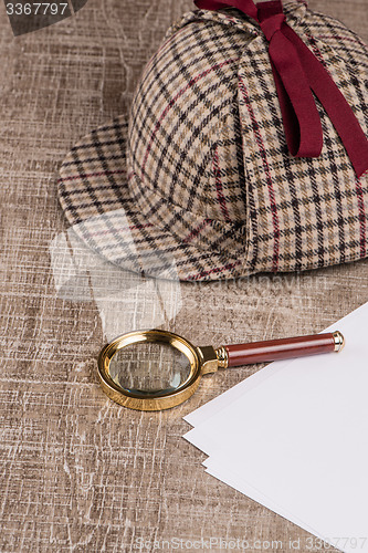 Image of Sherlock Hat and magnifying glass