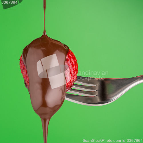 Image of Strawberry and chocolate on a fork