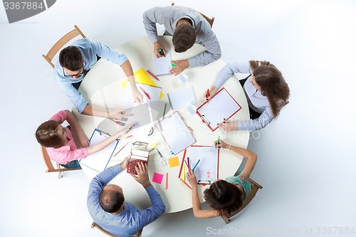 Image of Top view of business team on workspace background 