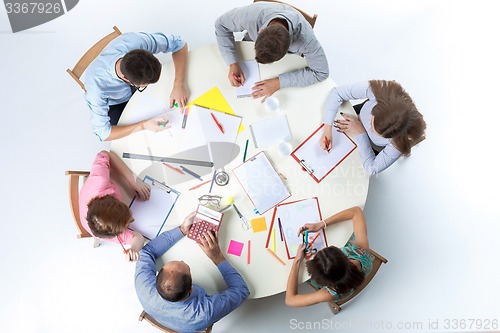 Image of Top view of business team on workspace background 