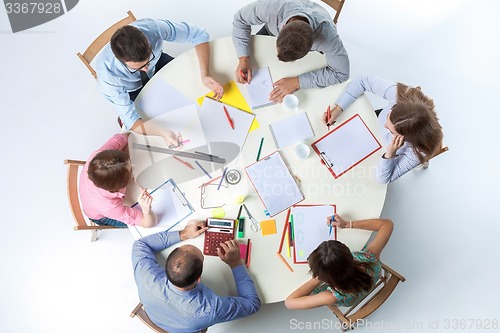 Image of Top view of business team on workspace background 