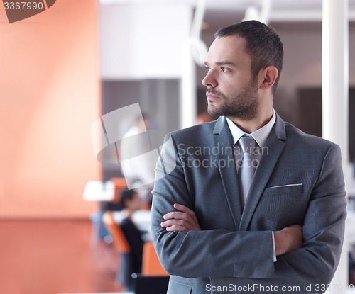 Image of young business man portrait  at modern office
