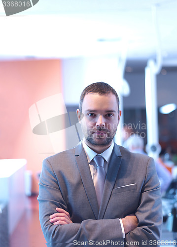 Image of young business man portrait  at modern office