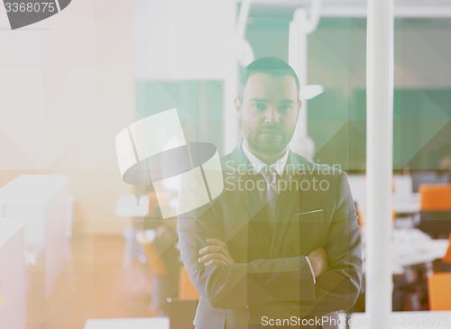 Image of young business man portrait  at modern office