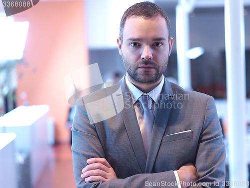 Image of young business man portrait  at modern office