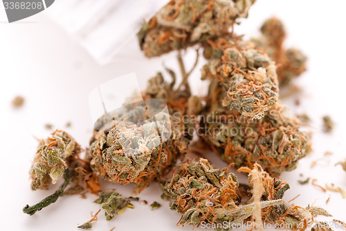 Image of Close up Dried Marijuana Leaves on the Table