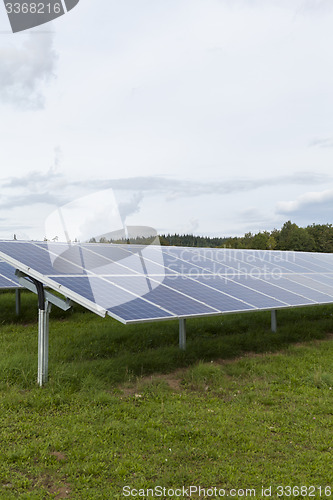 Image of Field with blue siliciom solar cells alternative energy