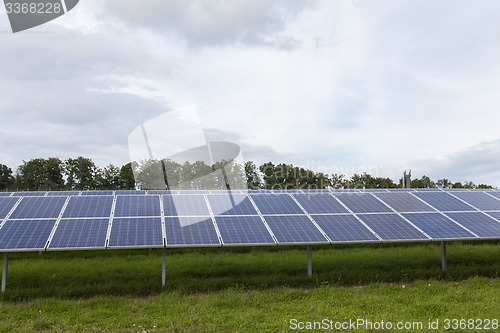 Image of Field with blue siliciom solar cells alternative energy