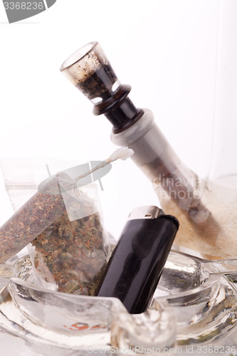 Image of Close up of marijuana and smoking paraphernalia