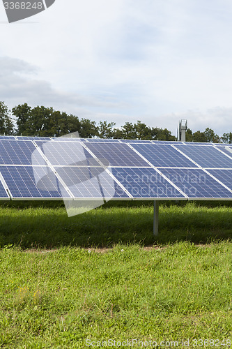 Image of Field with blue siliciom solar cells alternative energy