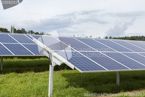 Image of Field with blue siliciom solar cells alternative energy