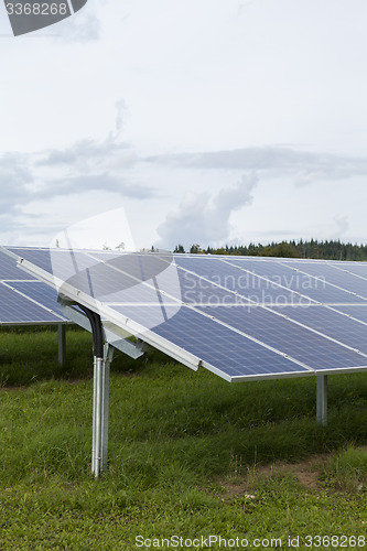 Image of Field with blue siliciom solar cells alternative energy