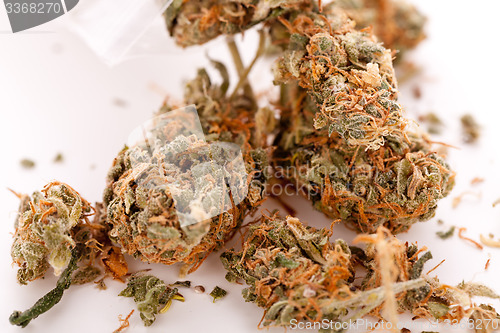 Image of Close up Dried Marijuana Leaves on the Table