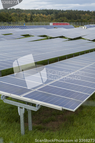 Image of Field with blue siliciom solar cells alternative energy