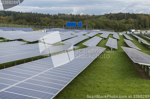 Image of Field with blue siliciom solar cells alternative energy