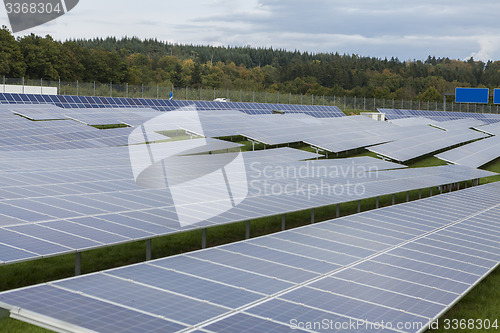 Image of Field with blue siliciom solar cells alternative energy