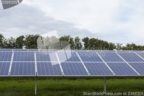 Image of Field with blue siliciom solar cells alternative energy