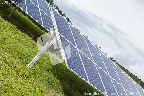 Image of Field with blue siliciom solar cells alternative energy