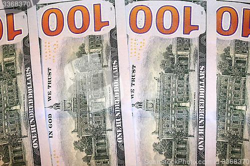 Image of reverse side of hundred dollar bank notes