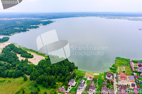 Image of Private houses on bank of lake