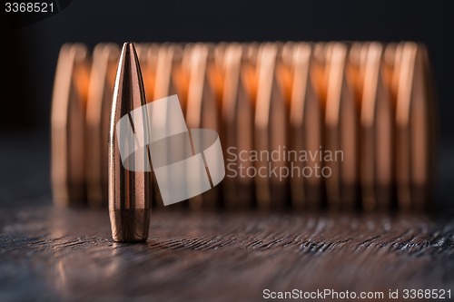 Image of Macro shot of copper bullets 