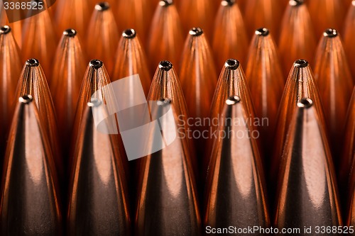 Image of Macro shot of copper bullets that are in many rows 
