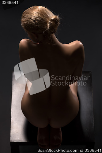 Image of Art nude picture of naked blonde in the studio