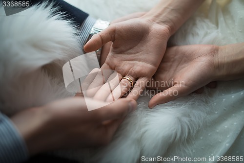 Image of Hands newlyweds