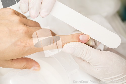 Image of Photograph potsesse manicure in a beauty salon.