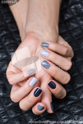 Image of Women\'s hands with a stylish manicure.