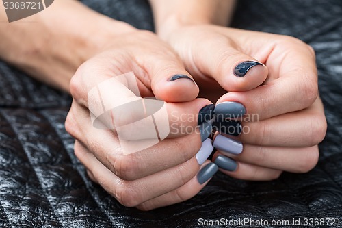 Image of Women\'s hands with a stylish manicure.