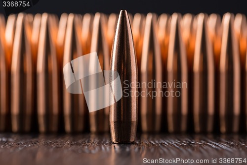 Image of Macro shot of copper bullets 