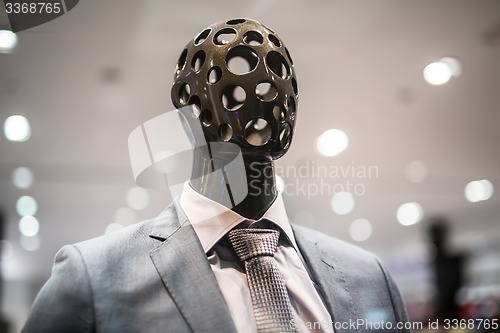 Image of Stylish mannequin outside showcases a shopping center