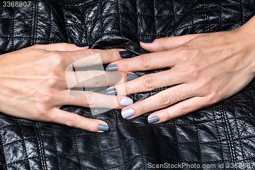 Image of Women\'s hands with a stylish manicure.