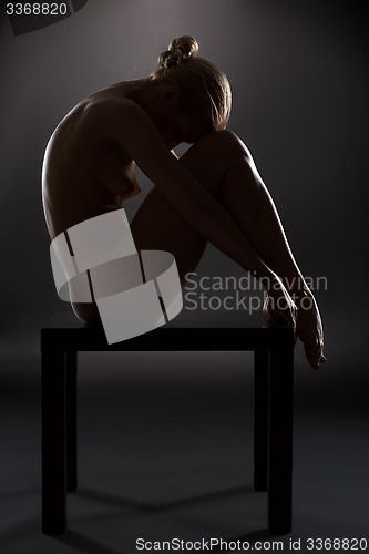 Image of Art nude picture of naked blonde in the studio