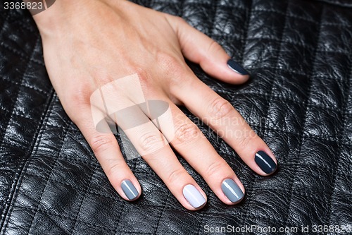 Image of Women\'s hands with a stylish manicure.