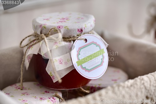 Image of Close up of a jar jam with empty tag