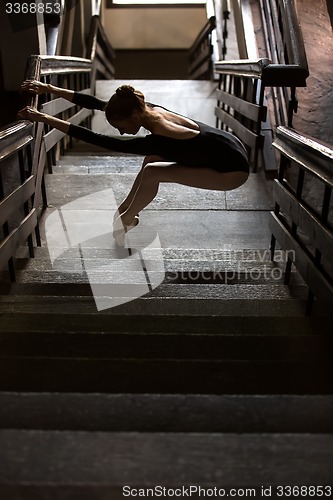 Image of Graceful ballerina standing in a graceful pose